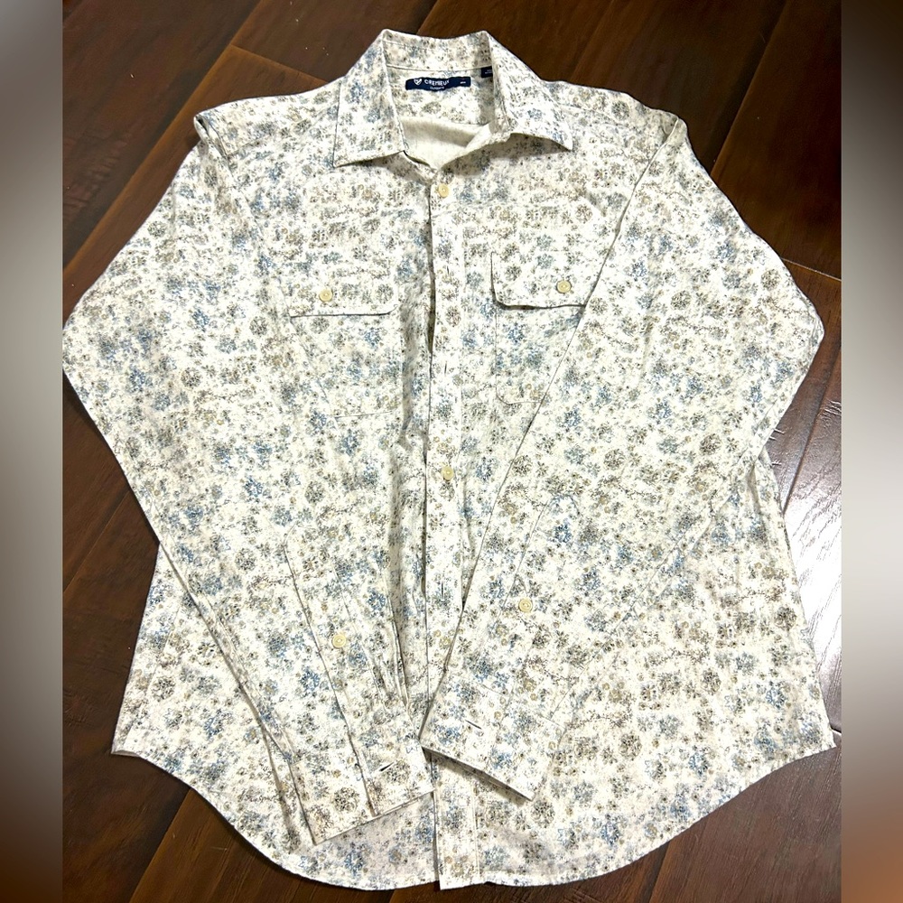 Men’s button down long sleeve shirt.